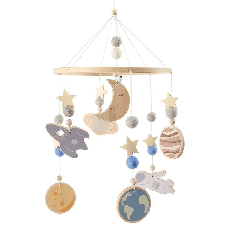 DreamMobile™ – Mobile musical en bois pour lit de bébé