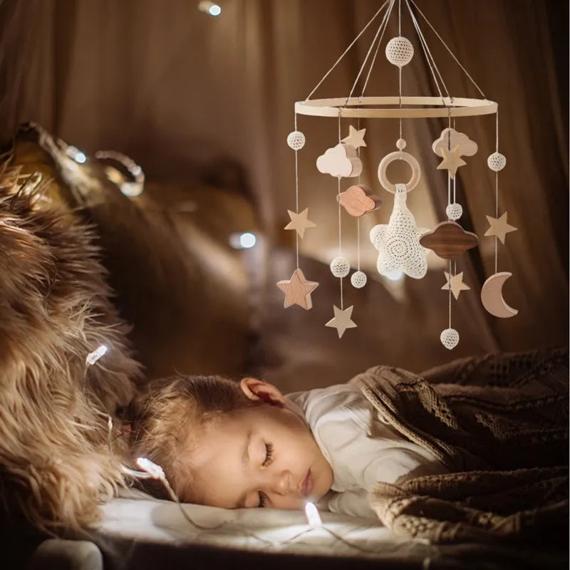 DreamMobile™ – Mobile musical en bois pour lit de bébé