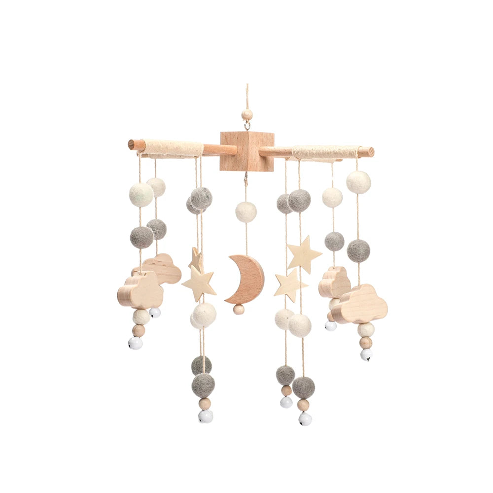 DreamMobile™ – Mobile musical en bois pour lit de bébé